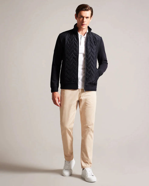 HAMSTE-Tops-Wrapping up never looked better. The HAMSTE jacket features a quilted front and funnel neck to keep out the breeze. Ideal for crisp morning walks and after work pints. Jacket Chevron quilted front Long sleeves Zip fastening Funnel neck Pockets Lewis is 6'2" / 1.88m and wears Navy in a Ted size 3- Ted Baker Romania